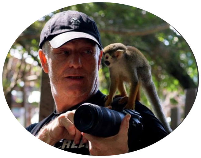Andy Pittway with camera and monkey on shoulder